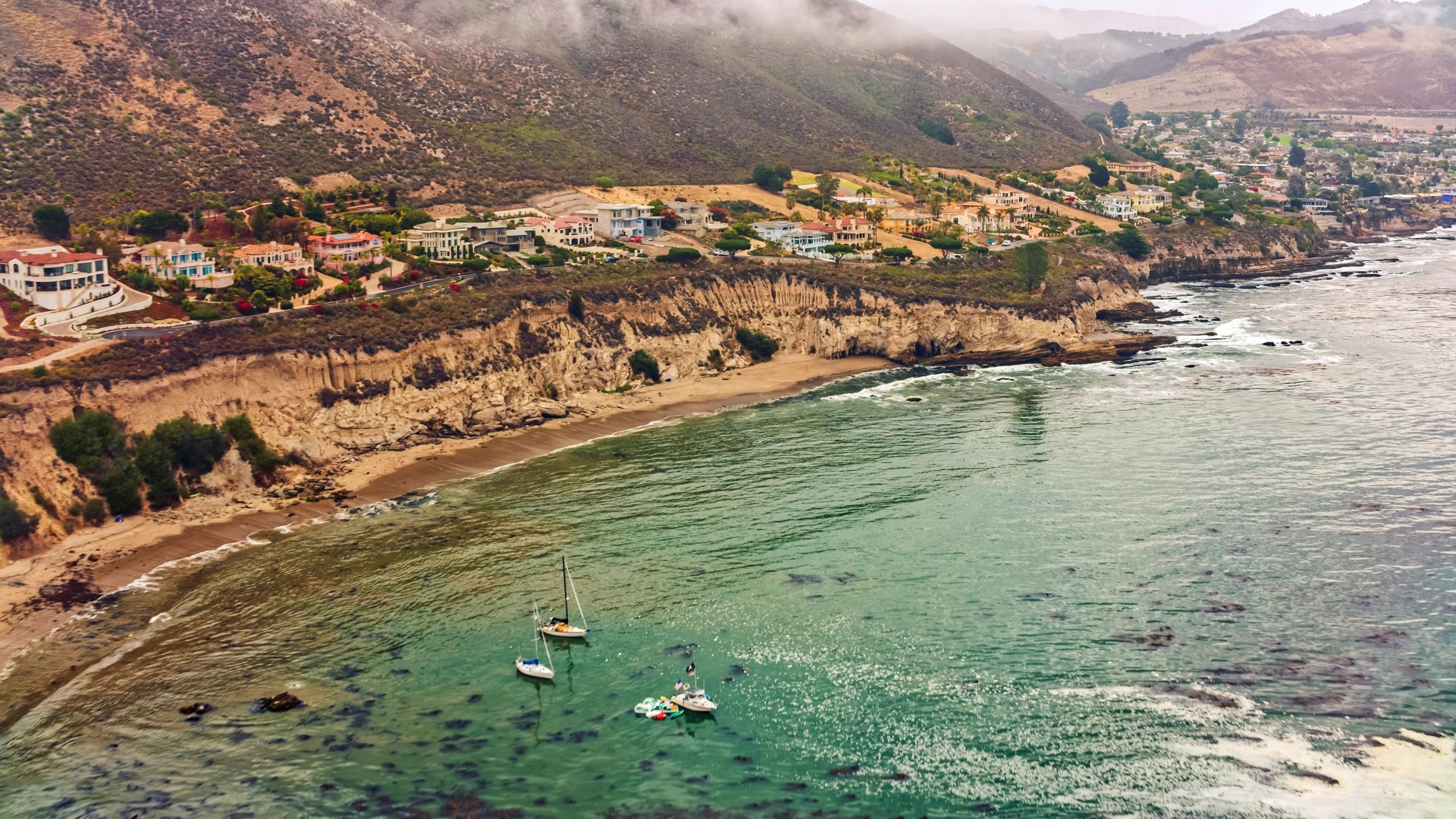 Southern California coastline aerial with yachts